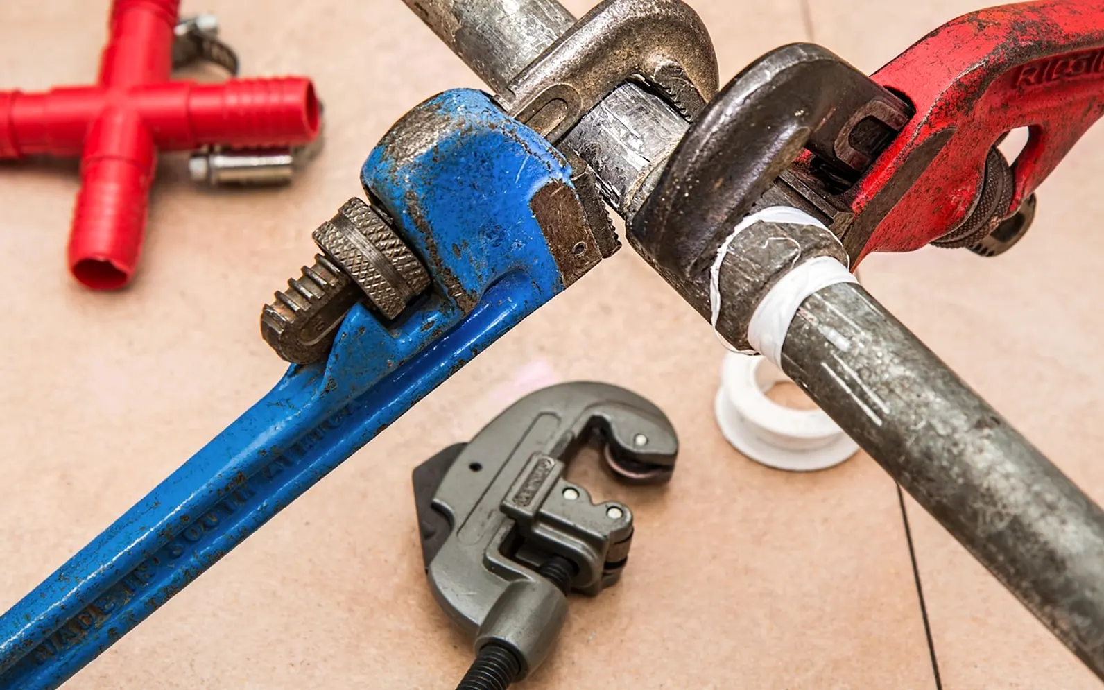 Plumbing, pipe and wrenches